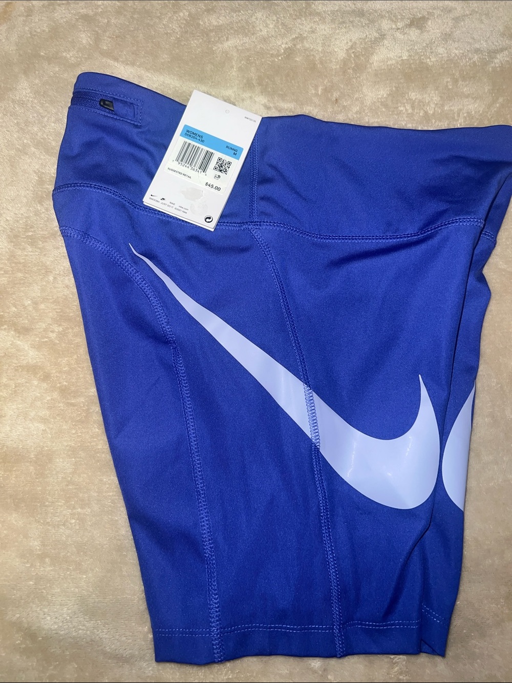 Nike Royal Blue Kids' Athletic Shorts with White Swoosh